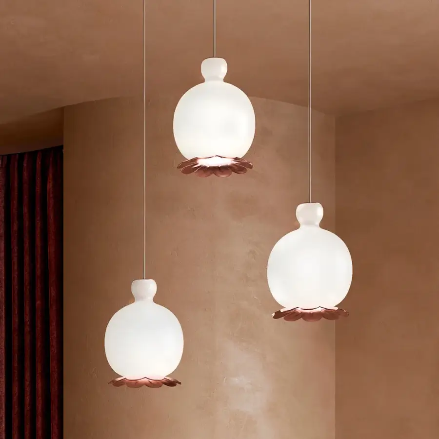 Elegant Kundalini Opyo suspension lamp with a white opal diffuser and copper-toned metallic petal structure crafted in Italy