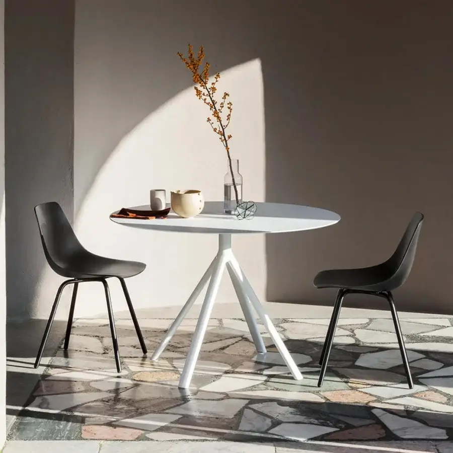 Elegant Lapalma Fork Outdoor table with white HPL laminate and slender powder-coated aluminum legs inspired by tree branches