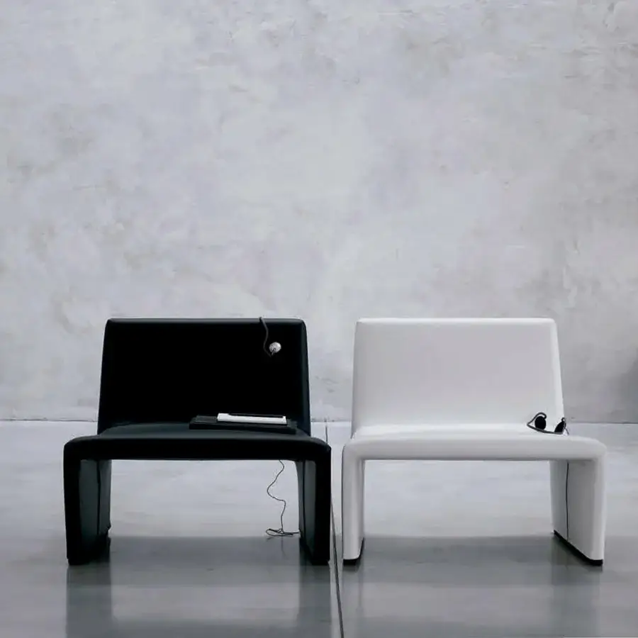 Superior Verzelloni Patty lounge chair in black polyurethane with metal insert and MDF feet