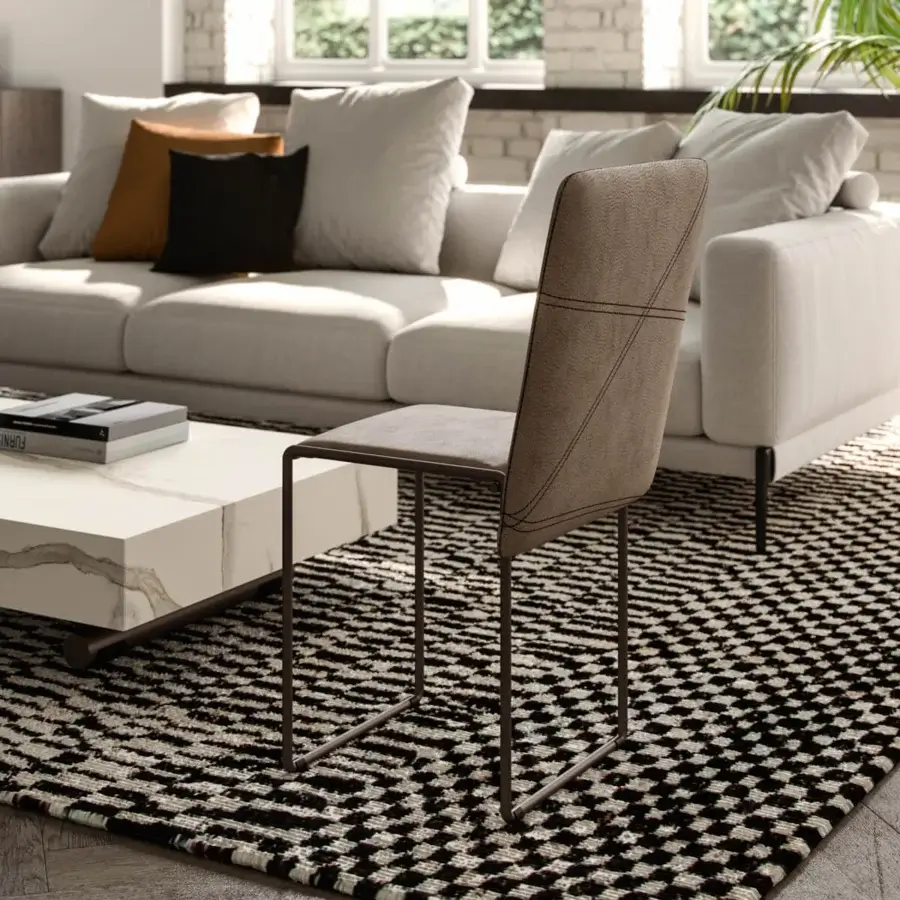 Superior Ozzio Italia Cubix convertible ottoman built with castors, upholstered chairs in light brown or gray matte finish, and dark metal frames