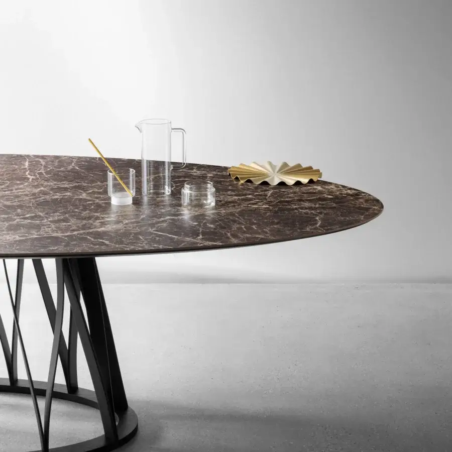 Exceptional Miniforms Acco table with mottled brown marbled tabletop and striking black metal base