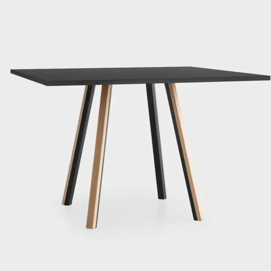 Distinguished Lapalma Ori table with a square HPL Fenix® top and slanted legs crafted with powder coated metal and solid ash wood in matte black