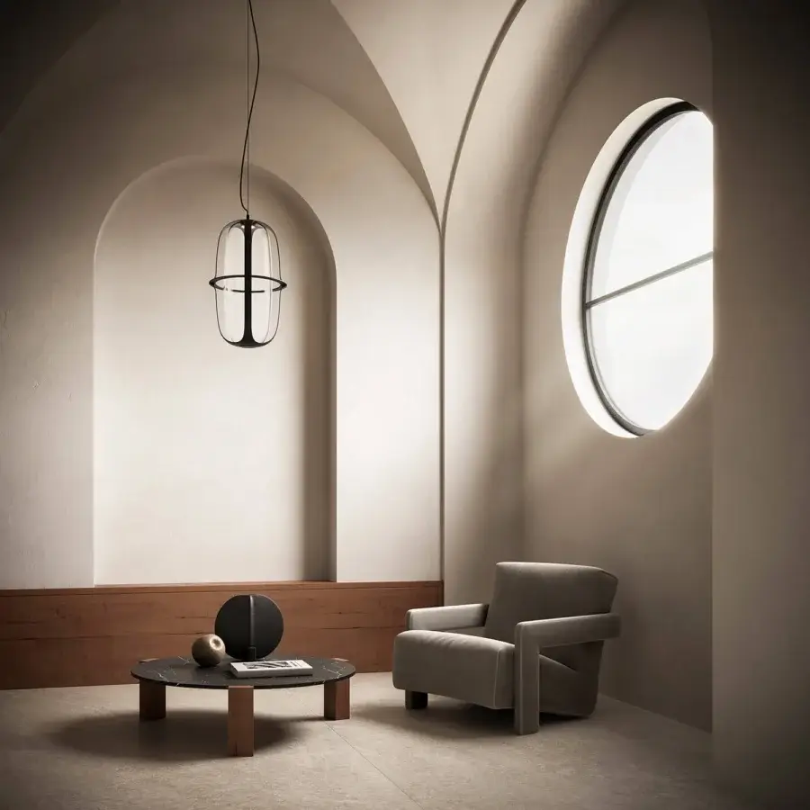 Distinguished Kundalini Kooi suspension lamp with transparent glass diffuser embraced by sleek die-casted aluminum framework