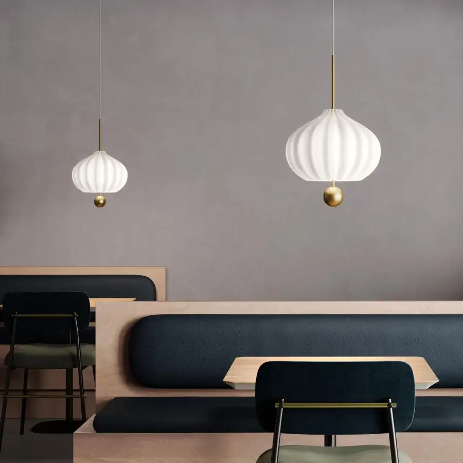 Distinguished Kundalini Lilli suspension lamp with a bulbous white opal glass diffuser and satin brass structure