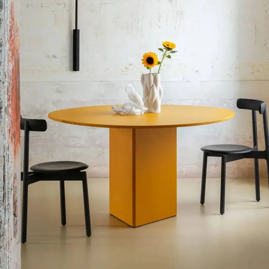 Distinguished Miniforms Albio table crafted in wood with a uniform matte yellow finish and balanced proportions