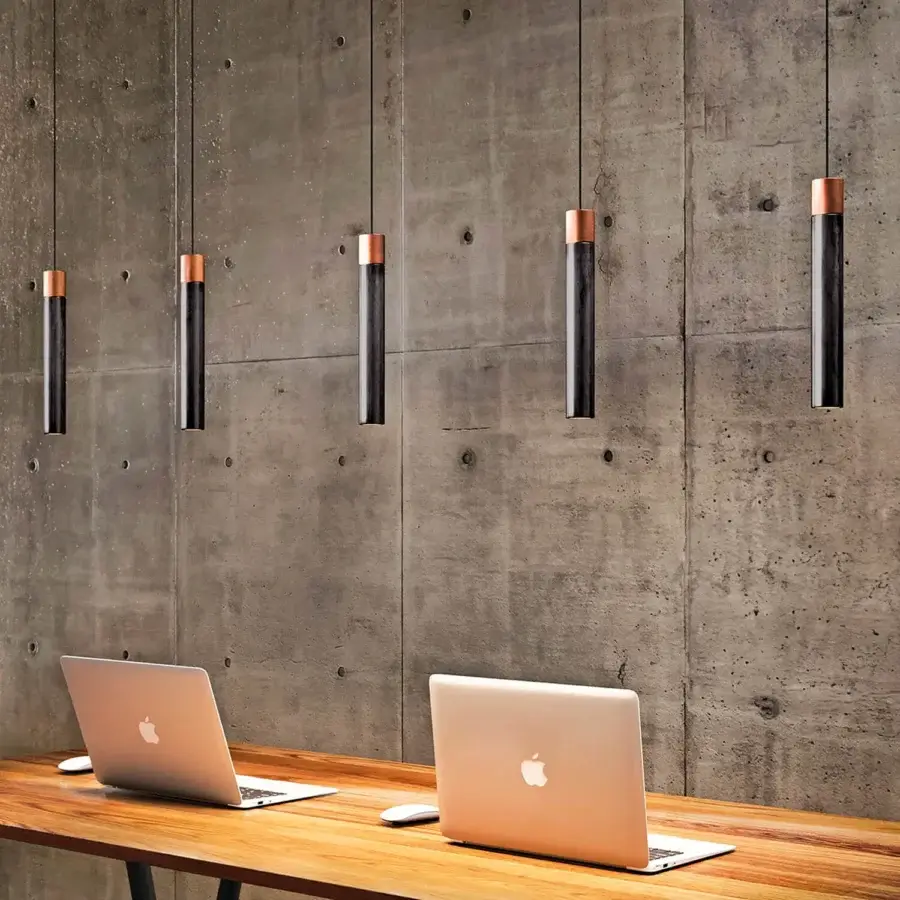 Distinguished Kundalini Minimal suspension lamp with polished black Barro Negro pottery and copper-colored metal built with a matte finish