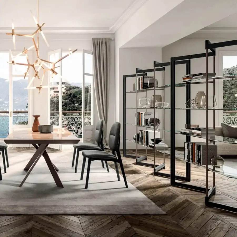 Superior Ozzio Italia Panto bookcase with a pantograph design and transparent glass shelves in a dark metal frame