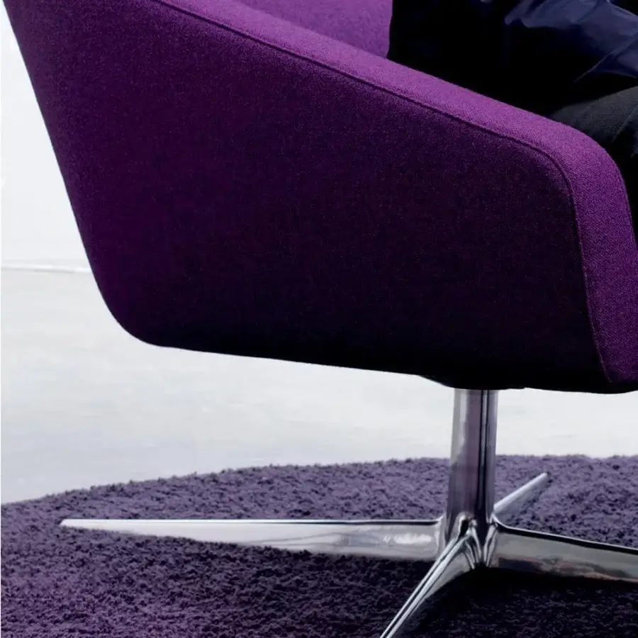 Superior Verzelloni Sillon lounge chair upholstered in textured deep purple textile with polished cast aluminum base