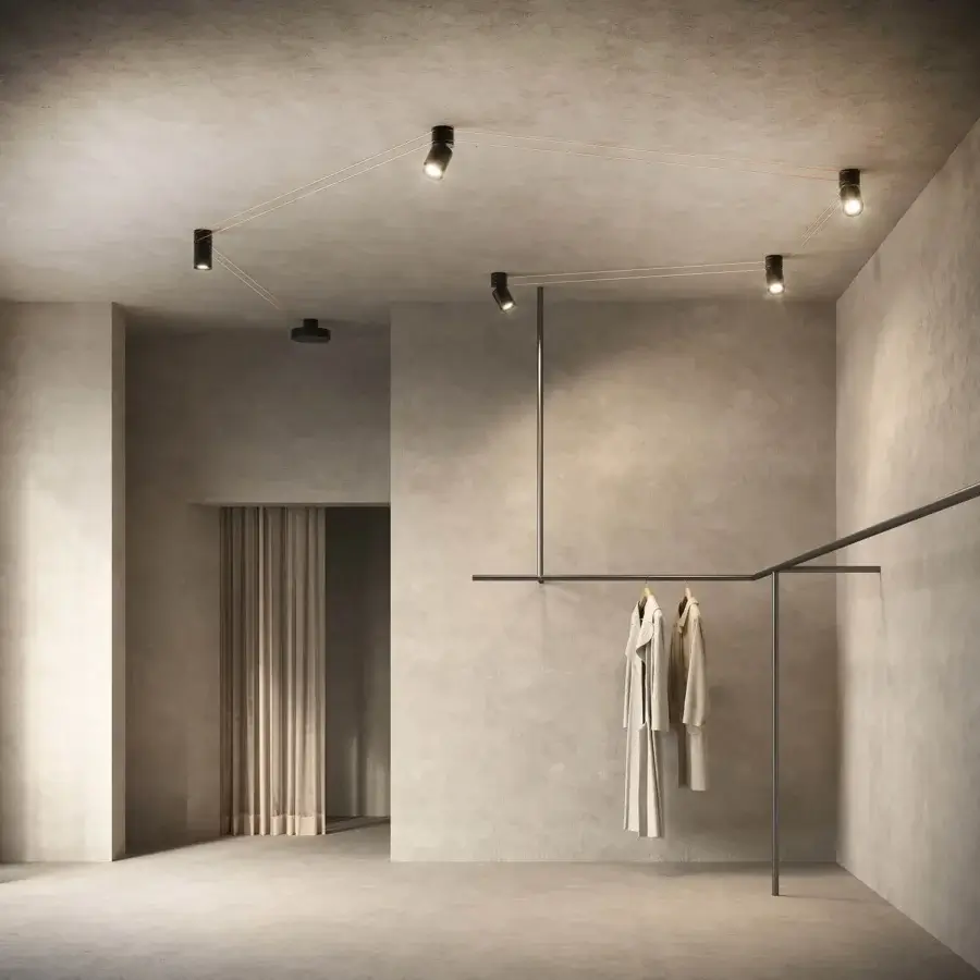 Superior Kundalini Mitos ceiling lamp with interconnected cylindrical fixtures and dark matte metallic coating