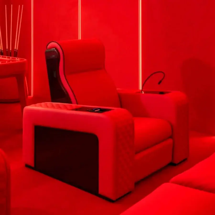 Exceptional Vismara Luxor Tech home cinema seating in vibrant red textile with lacquered wood and chrome steel cupholders
