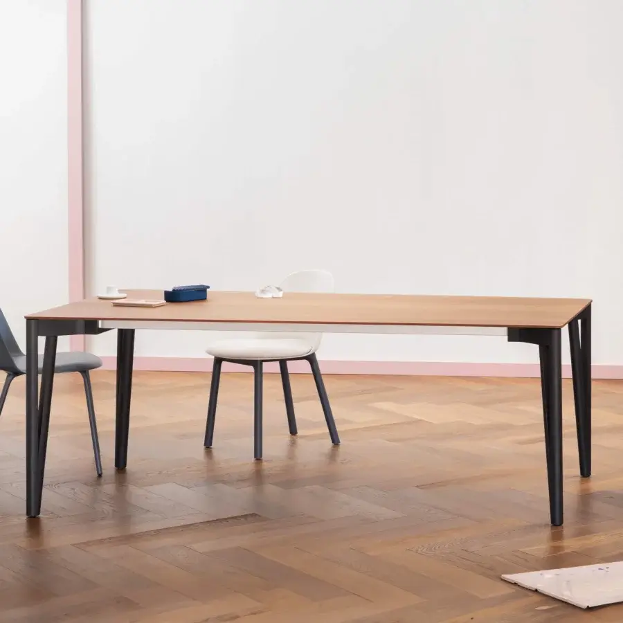 Elegant Miniforms Decapo table with wood-like top and dark ‘V’ shaped legs crafted in Italy