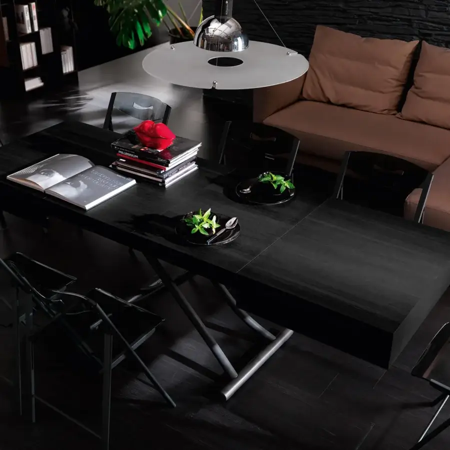 Distinguished Ozzio Italia Box transformable coffee to dining table in black matte wood with a metal base and hidden wheels