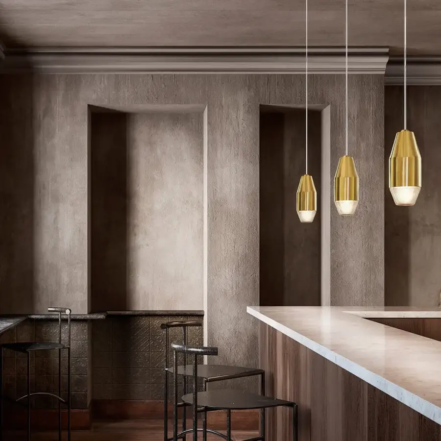 Superior Kundalini Yuma suspension lamp with spun metal reflector and blown glass diffuser in polished brass finish
