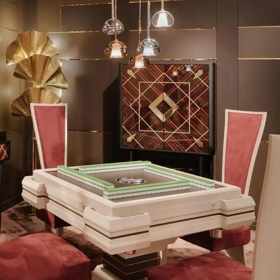 Exclusive Vismara Ming Mahjong table built in light cream lacquer with steel details and green velvet cloth