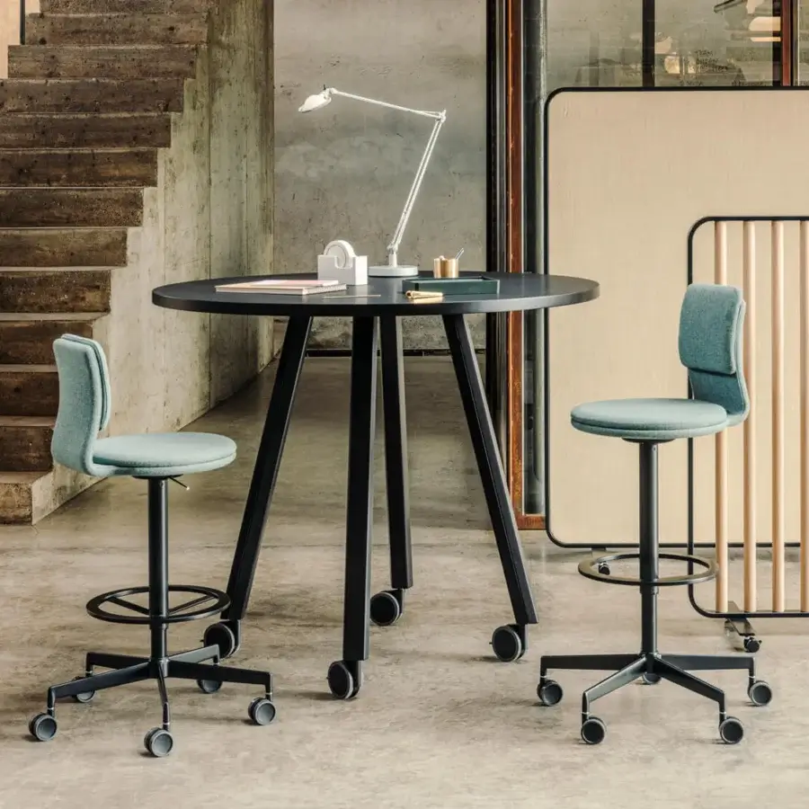 Elegant Lapalma Ori workstation with a round dark wood or HPL Fenix® top and bent metal legs built with solid ash wood