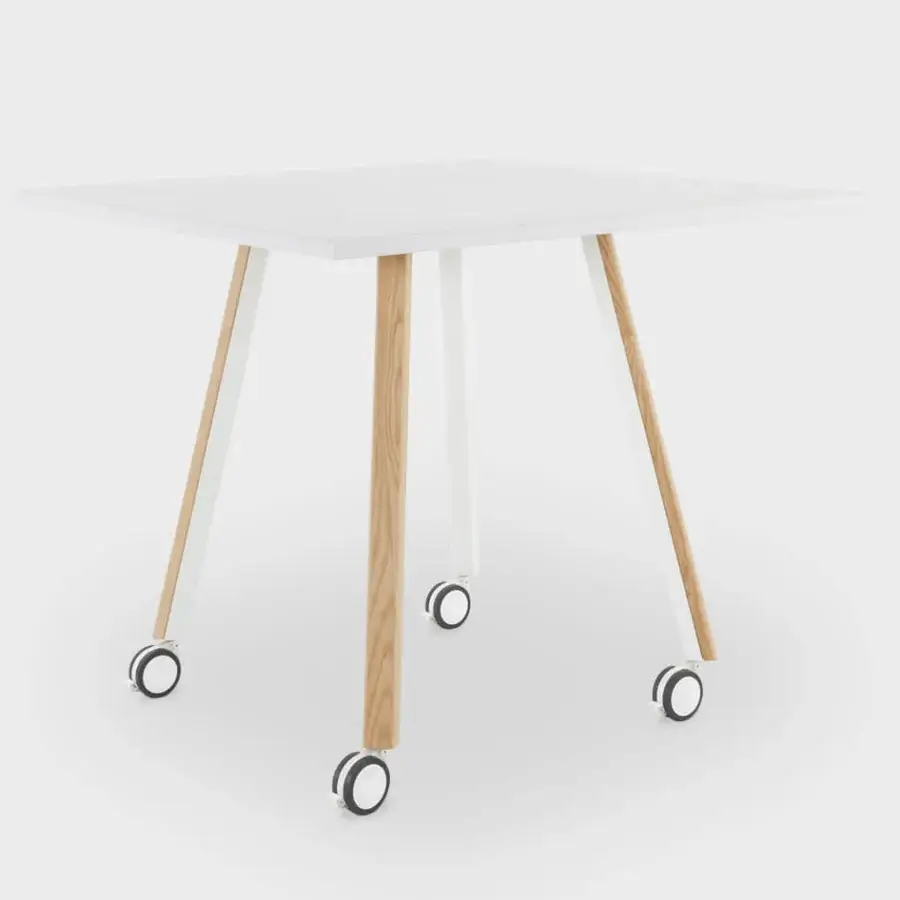 Distinguished Lapalma Ori workstation with a matte white HPL Fenix® top, crafted with bent metal legs and light ash wood with black castors