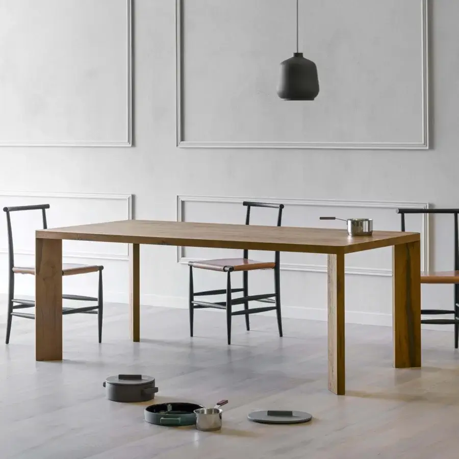 Distinguished Miniforms Manero table in medium-toned brown solid wood with a matte finish showcases skilled joinery and clean lines