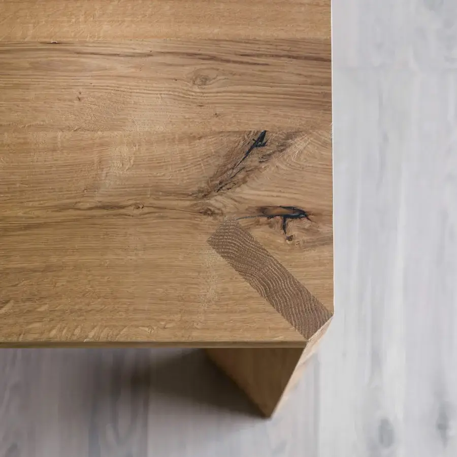 Distinguished Miniforms Manero table crafted in Italy with light brown wood and contrasting accents showcasing mitered corner joints