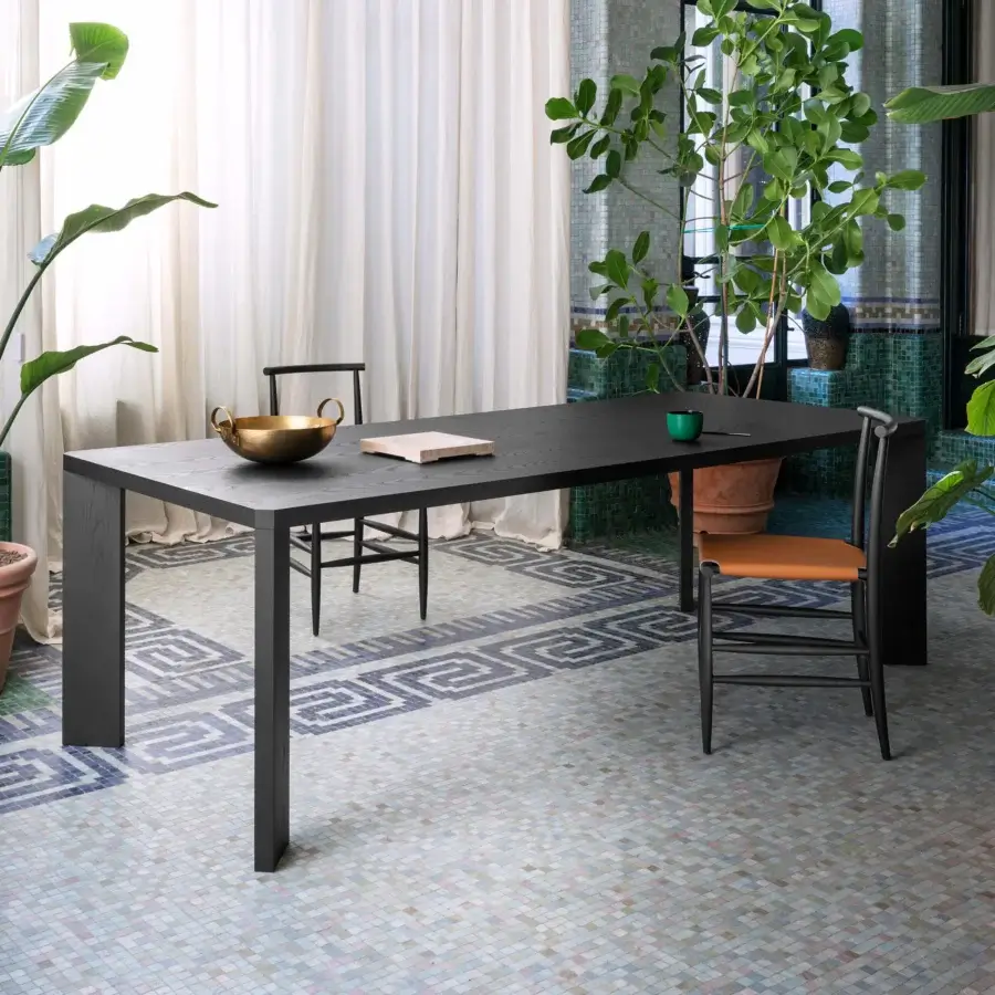 Distinguished Miniforms Manero table crafted in wood with a dark matte finish displaying clean lines and thick legs