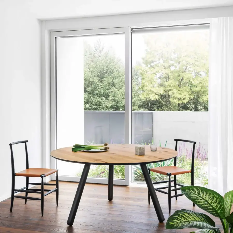 Distinguished Miniforms Pixie table with a light brown wooden top and smooth finish supported by black splayed legs
