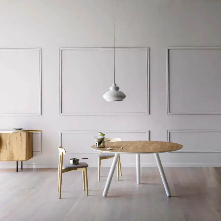Elegant Miniforms Pixie table crafted with a light-toned wood tabletop and white cylindrical legs with a matte finish