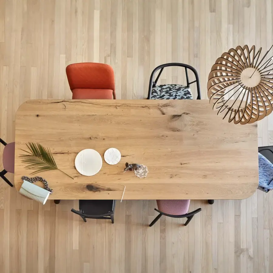 Distinguished Miniforms Pixie table crafted with a light brown wooden top and matte finish showcasing natural grain patterns with minimalist black legs