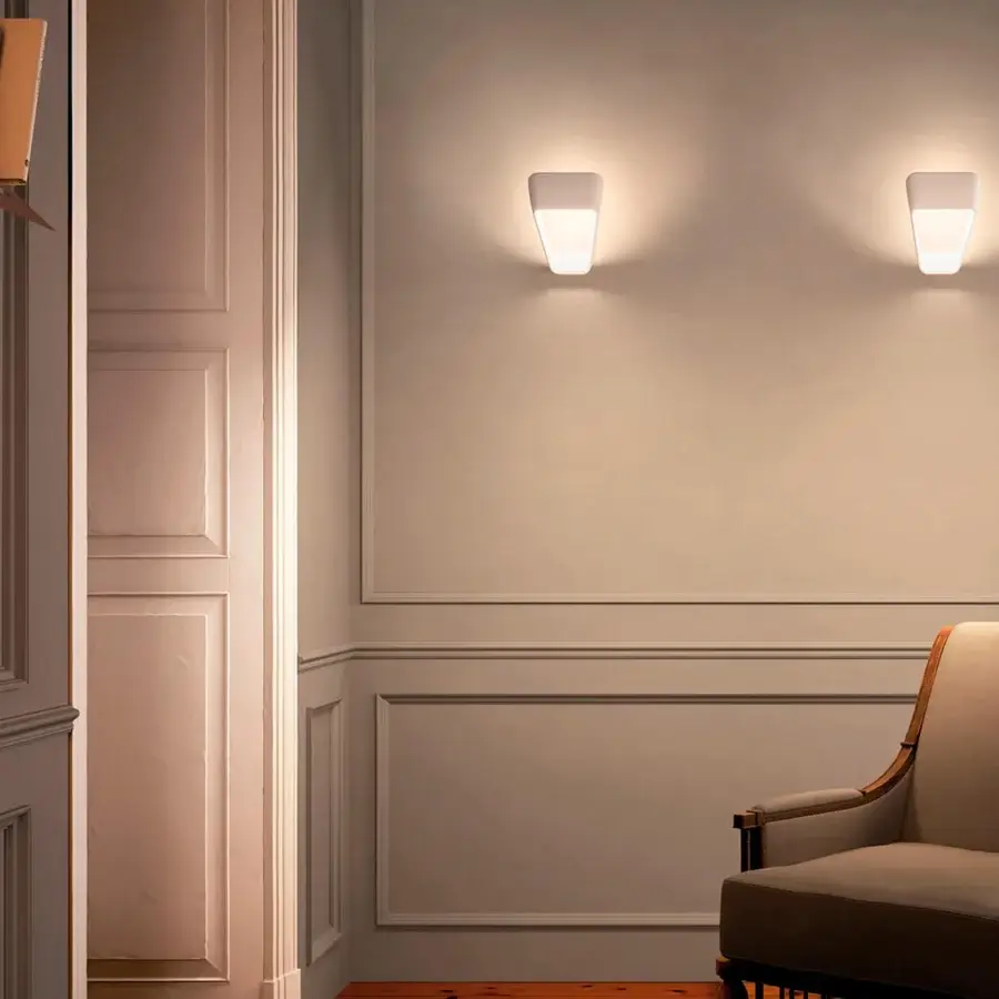 Elegant Kundalini Frame wall lamp with die-casted aluminum diffuser and matte varnished unified structure