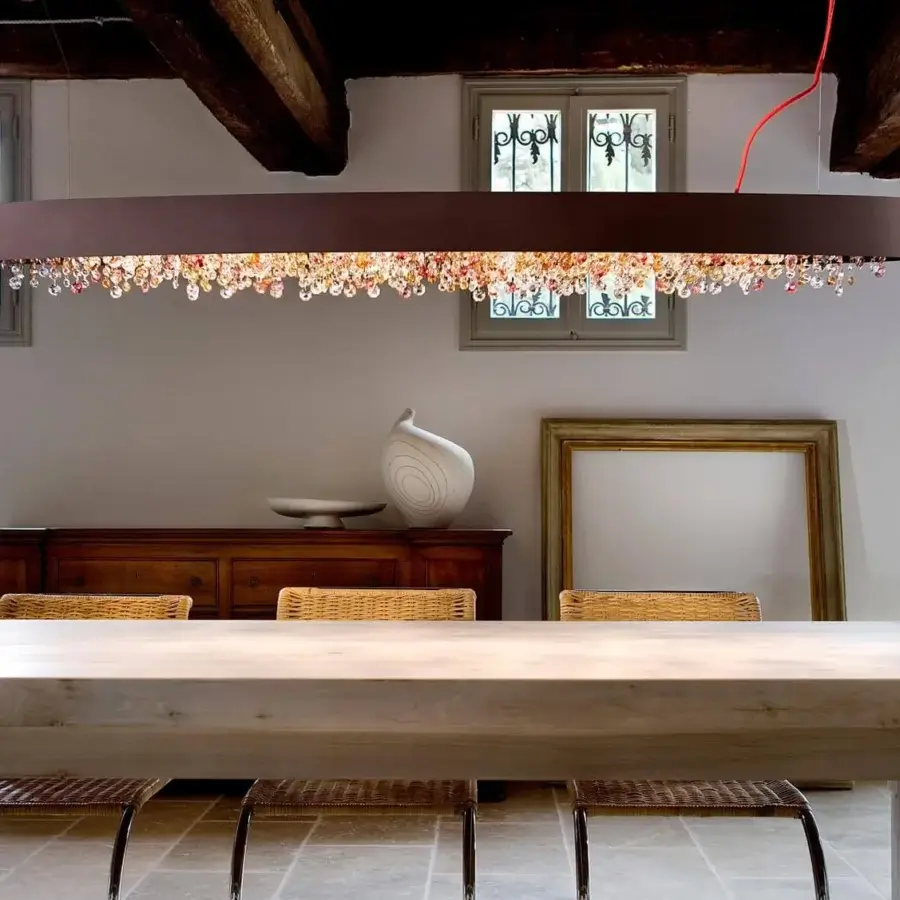 Distinguished Masiero Olà Ovale suspension lamp with burnished metal and warm amber coated Italian glass pendants