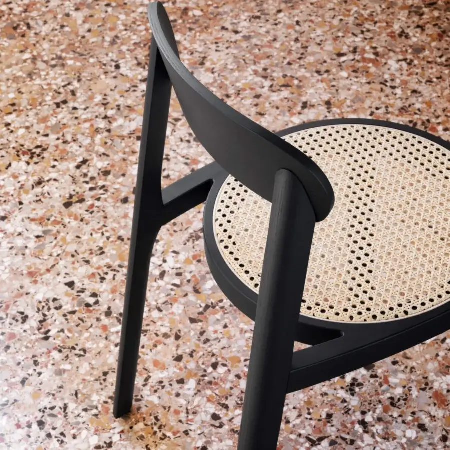 Exceptional Miniforms Brulla chair crafted in wood with matte black finish and woven cane seat