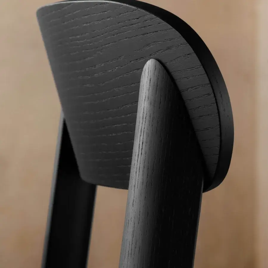 Distinguished Miniforms Brulla chair built in wood with a dark matte finish and cane-webbed seat