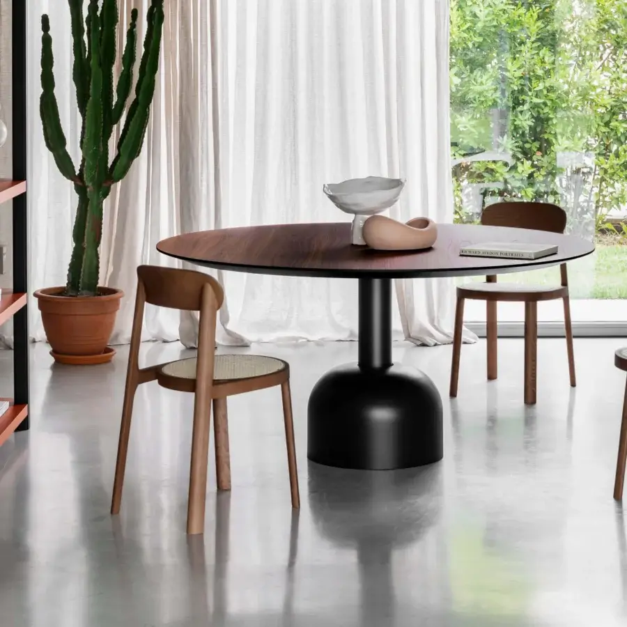 Exceptional Miniforms Brulla chair, a stackable seat in light to medium brown with curved backrest and cane-webbed construction crafted in Italy