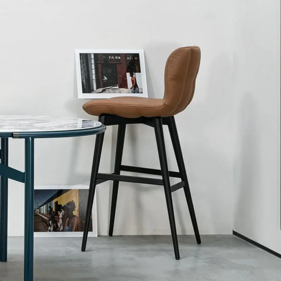 Elegant Cierre1972 Alain bar stool with soft cushions and a dark matte frame built in smooth brown material