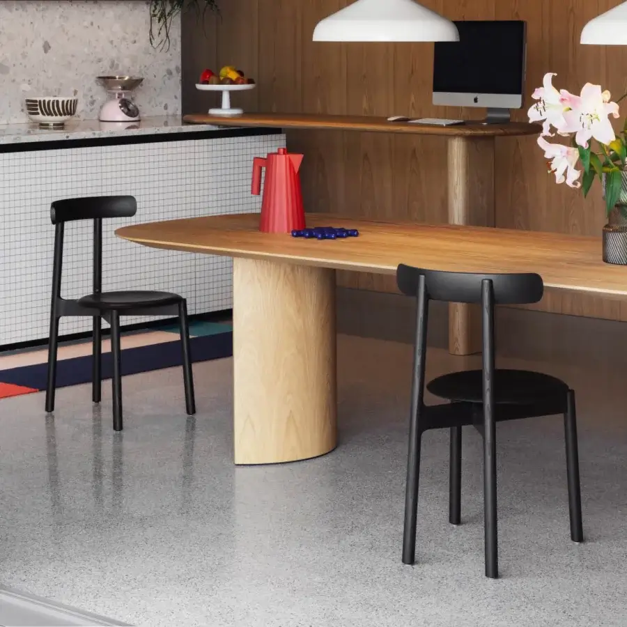 Elegant Miniforms Bice chair crafted in Italy with a matte black finish and distinctive flap-ears backrest
