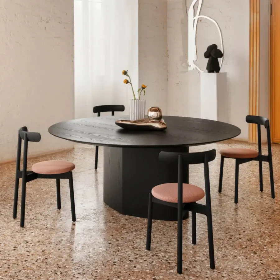 Superior Miniforms Bice chair crafted in matte black wood with salmon cushioning and distinctive flap-ears