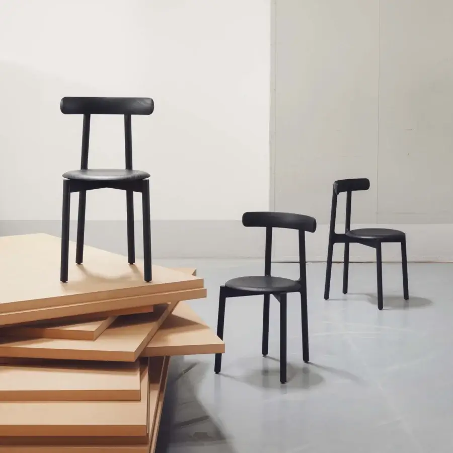 Elegant Miniforms Bice chair with a unique flap-ears backrest and geometric lines in a dark matte finish crafted in Italy