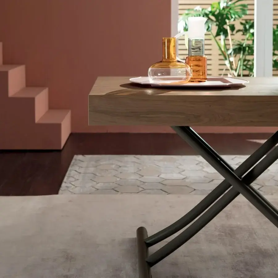 Elegant Ozzio Italia Newood transformable table with medium brown wood and dark gray metal supports in matte finish