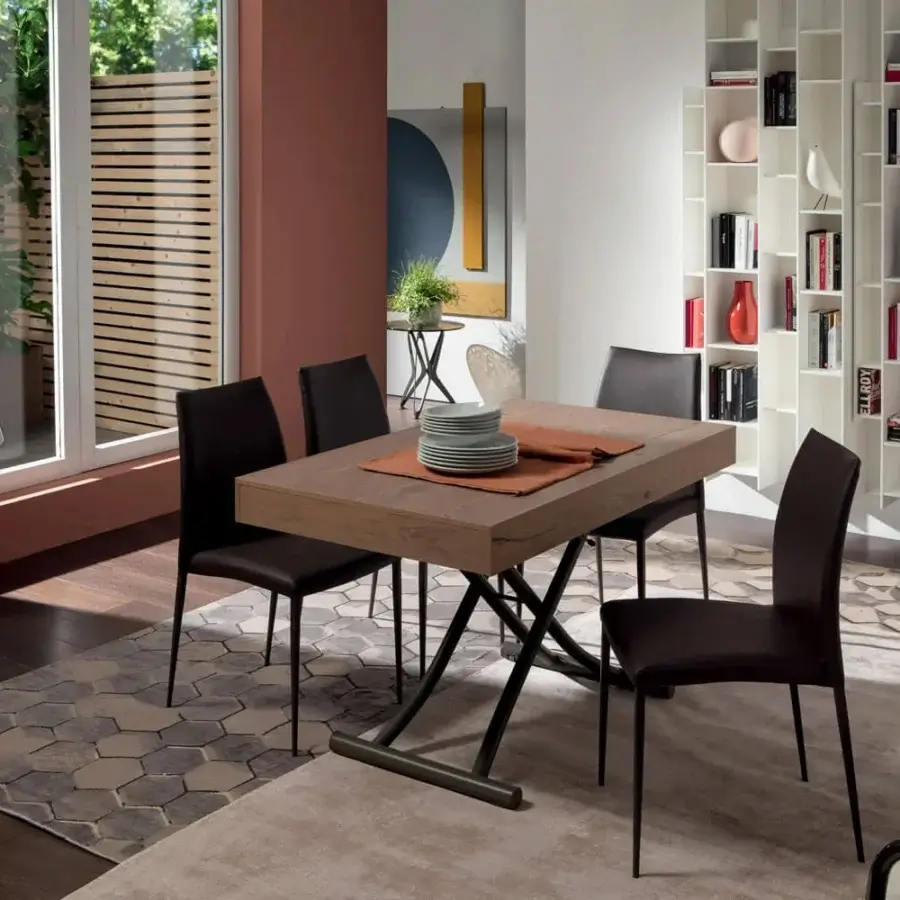 Distinguished Ozzio Italia Newood transformable table with medium brown wood, dark metal X base and matte finish