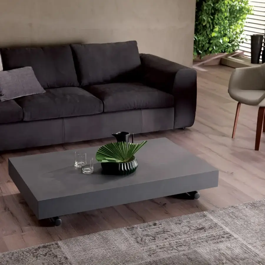 Distinguished Ozzio Italia Newood transformable table with dark gray concrete-like top and sleek geometric lines