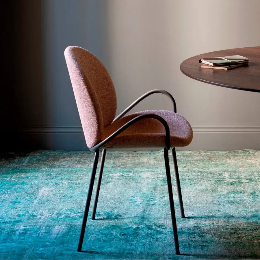 Distinguished Bross Baltea armchair crafted with metal structure fully upholstered in textured reddish-brown fabric