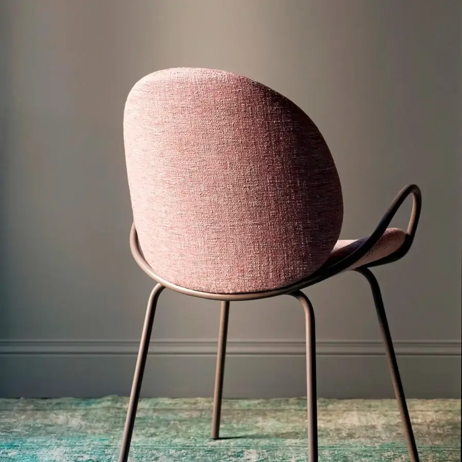 Superior Bross Baltea armchair with metal frame fully upholstered in light pink textured woven fabric and matte finish