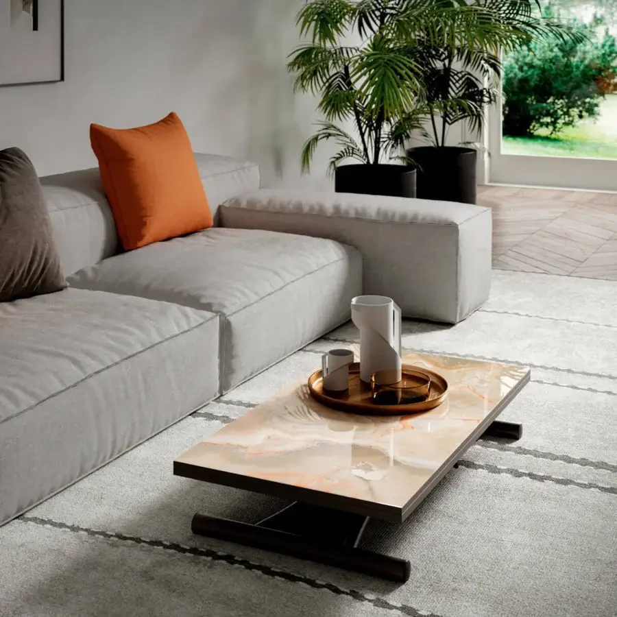 Exceptional Ozzio Italia Mondial transformable table with swirling light-toned marble glass and sleek metal structure built with castors