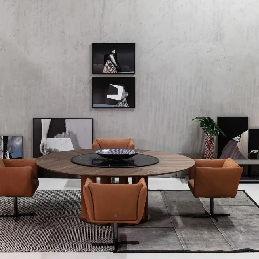 Distinguished Cierre1972 Mademoiselle swivel armchair upholstered in solid brown-orange textile with a matte finish