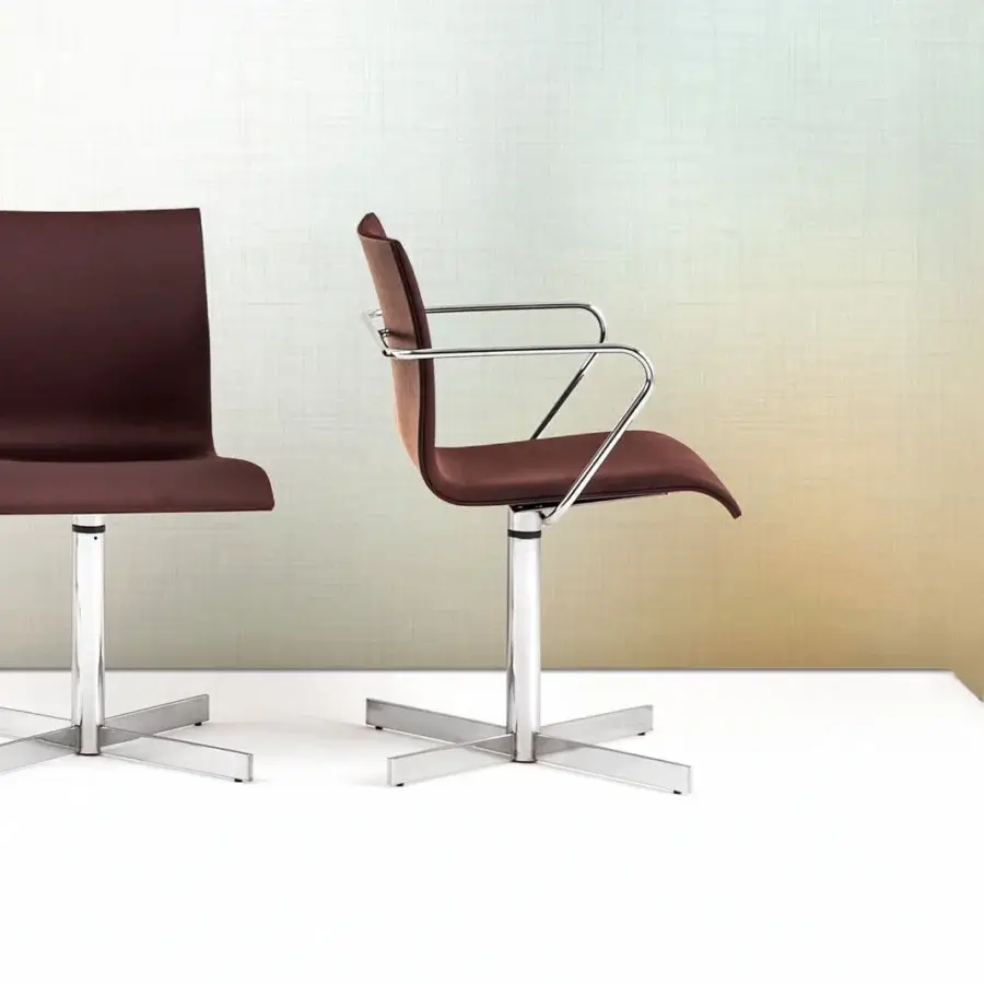 Superior Bross Bee swivel armchair with dark brown fabric upholstery and shiny silver-toned metal built with a sleek base