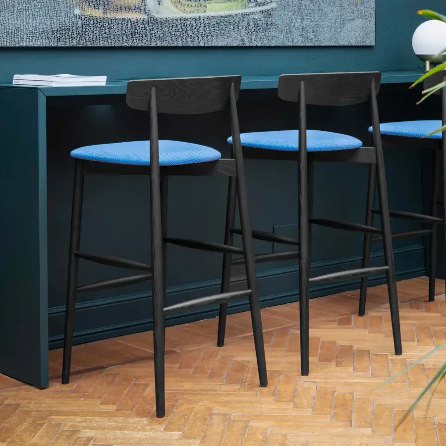 Impeccable Miniforms Claretta stool in dark wood and blue upholstery presents a skillfully crafted Italian seat with turned legs
