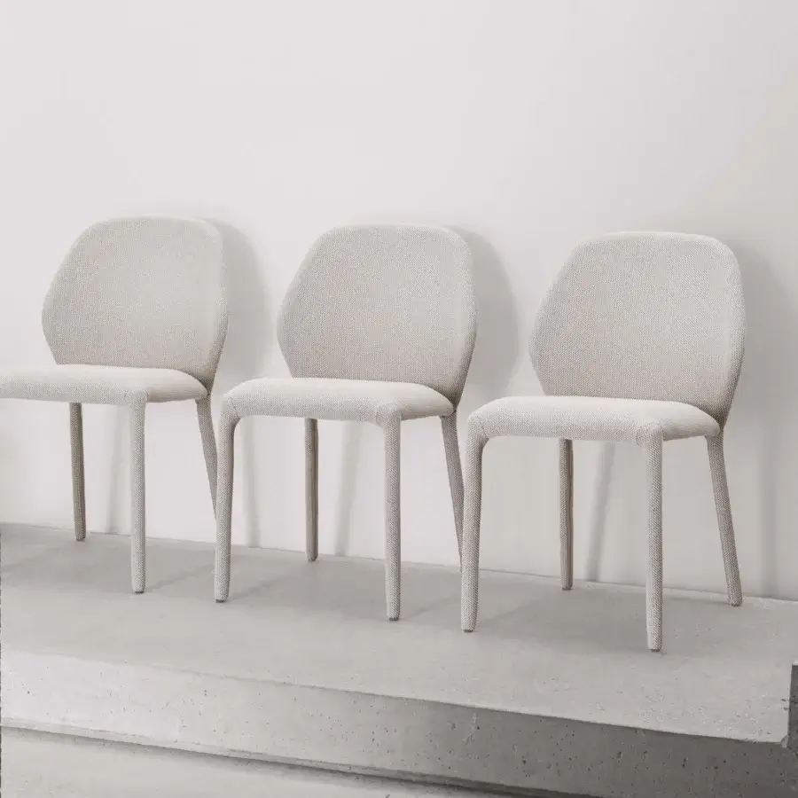 Captivating Miniforms Dumbo chair with light beige woven textile upholstery and curved lines crafted in Italy