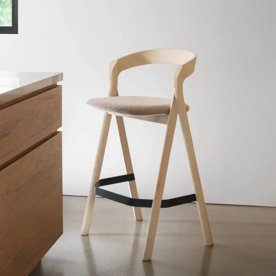 Distinctive Miniforms Diverge stool with a compass-inspired frame in light wood and matte finish, complemented by a beige upholstered seat and black support bar