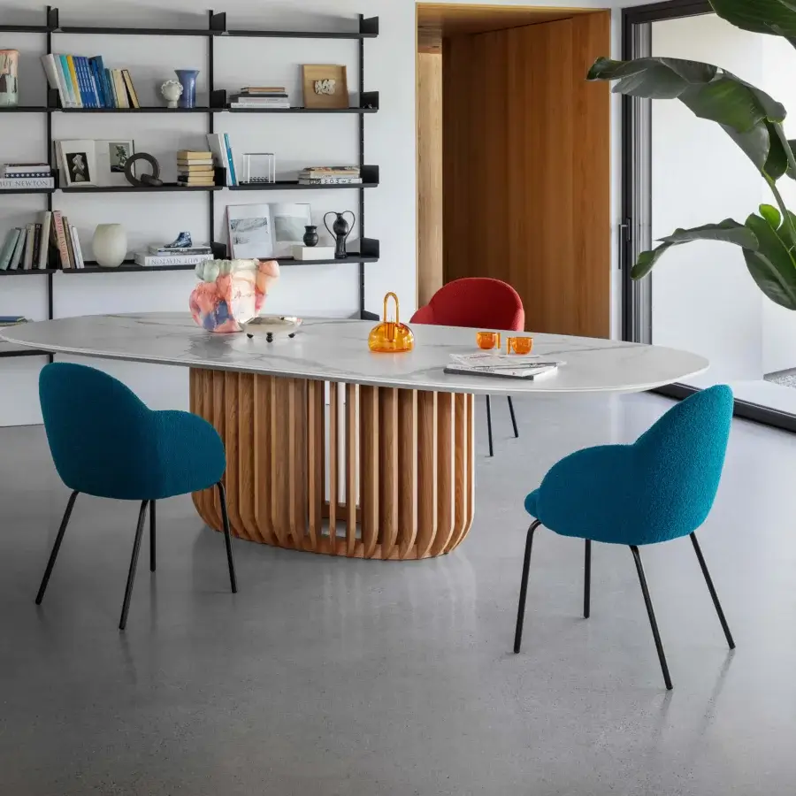 Distinguished Miniforms Iola armchair with deep blue textured textile and slender black metal legs