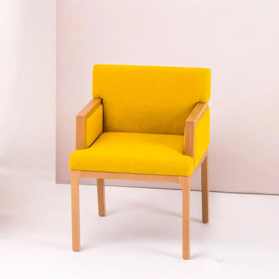 Exceptional Bross Flux armchair upholstered in bright yellow fabric with a light-toned wood structure and matte finish