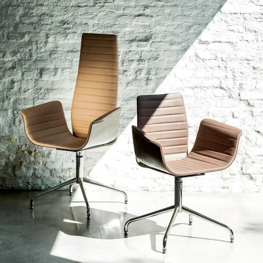 Lavish Bross Meeting armchair with tan-brown quilted fabric and sleek metal four-legged base crafted in Italy