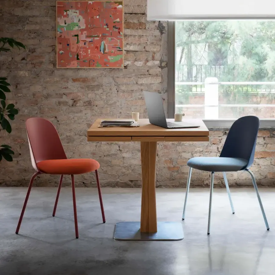 Distinguished Miniforms Mariolina Basic chair with reddish-brown frame and textured orange polypropylene seat embodies a modern, armless silhouette